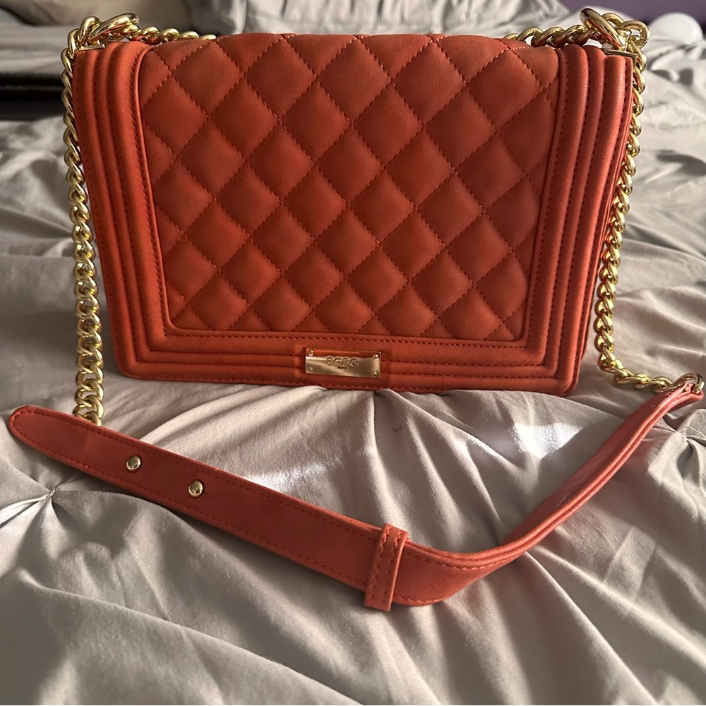 BCBG orange quilted purse